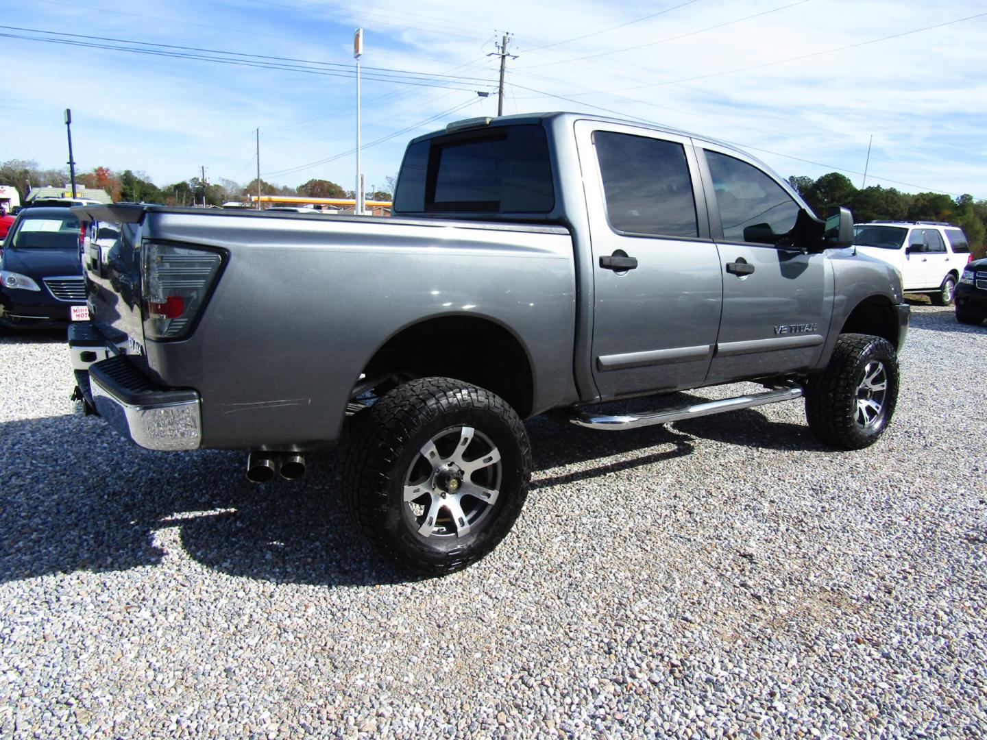 2013 Gray /Gray Nissan Titan SV Crew Cab 4WD (1N6AA0EJ3DN) with an 5.6L V8 DOHC 32V engine, Automatic transmission, located at 15016 S Hwy 231, Midland City, AL, 36350, (334) 983-3001, 31.306210, -85.495277 - Photo#7